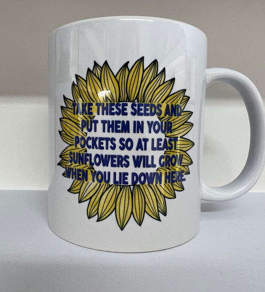 Put these Seeds in your Pocket so at least Sunflowers will grow when you lie down here Mug