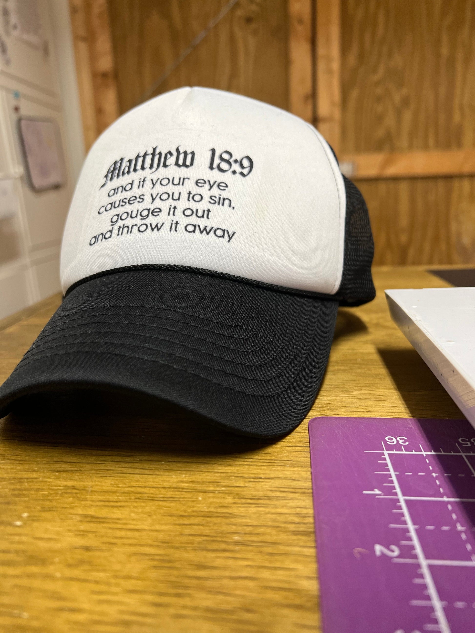 Matthew 18:9 Trucker Hat